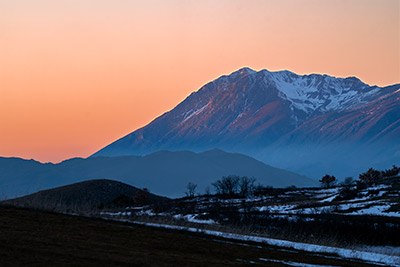 Miniatura: tramonto sulle montagne di Aschi